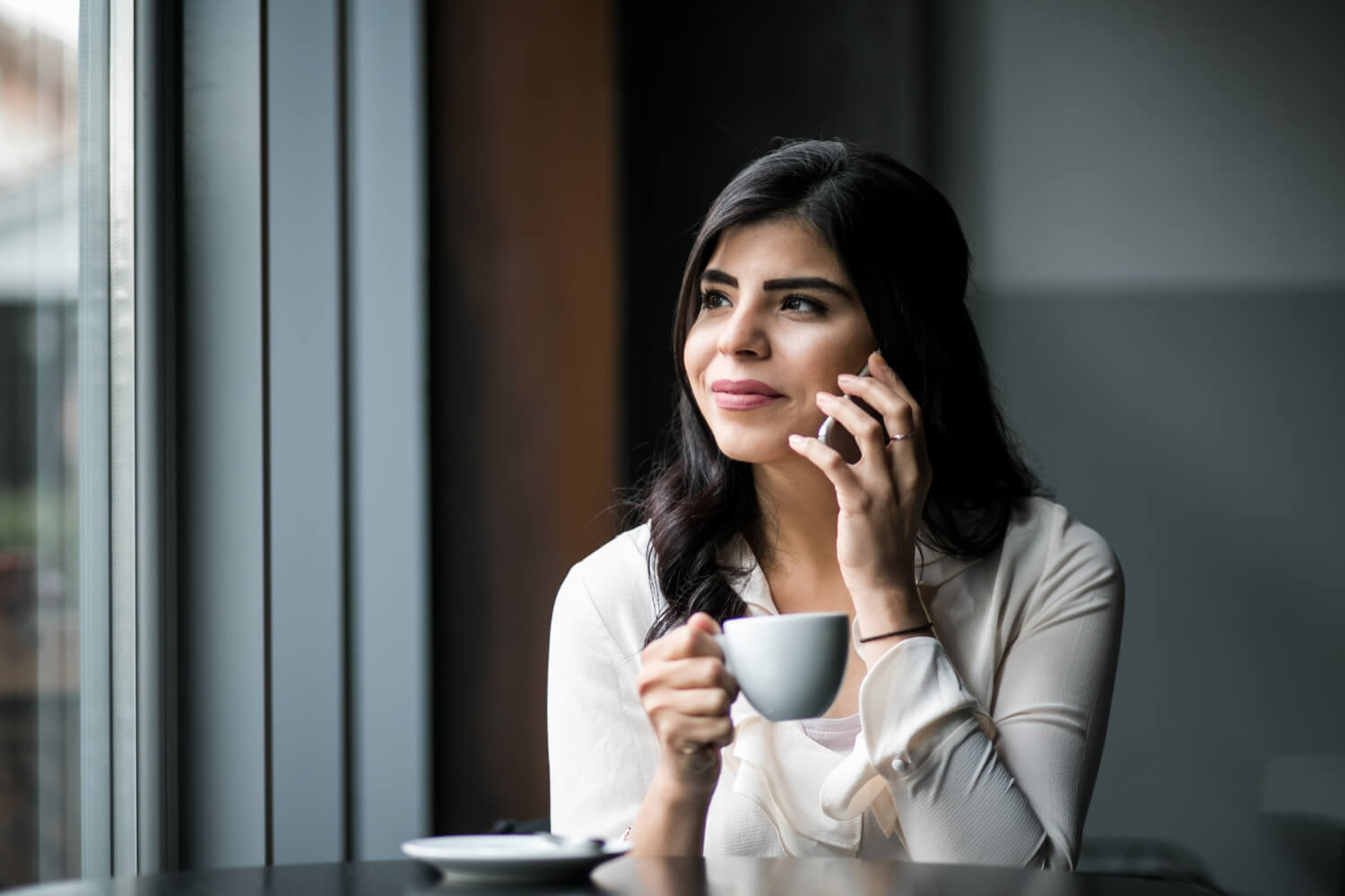 eastern-woman-with-phone (1)